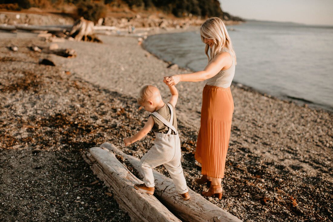 Family gathered together for a relaxed portrait on the PNW coast