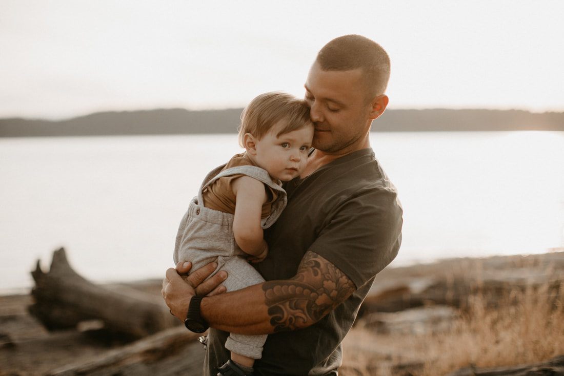 Family portrait with the Puget Sound shoreline in the background