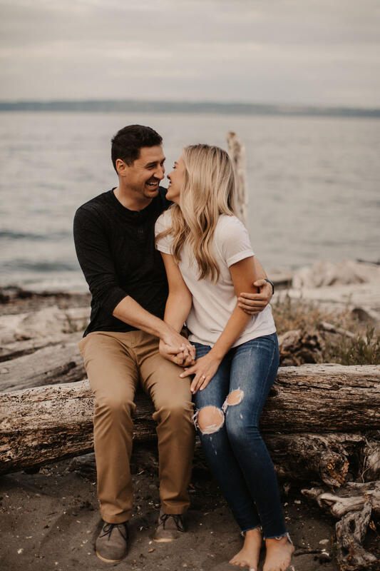 Close-up portrait of the couple embracing in the lush PNW forest