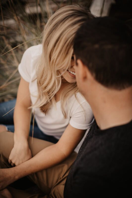 A close, tender portrait of the couple in the forest
