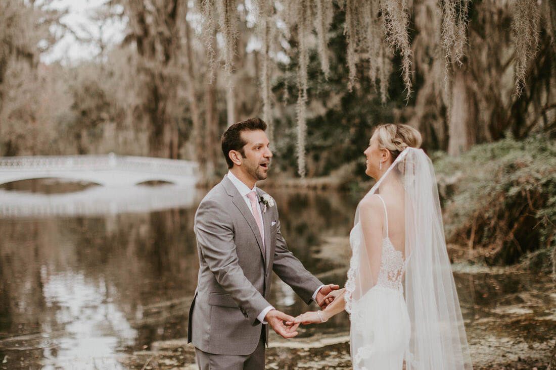 Close-up detail of Lindsey's bridal gown and bouquet at the Magnolia Plantation