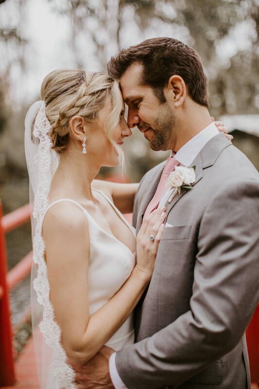 Close-up bridal portrait of Lindsey against the plantation's historic architecture