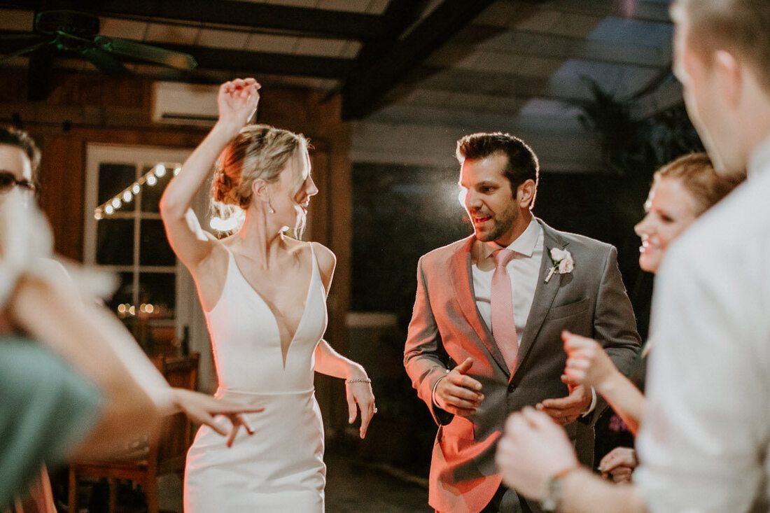 Lindsey and John laughing together during their post-ceremony portraits