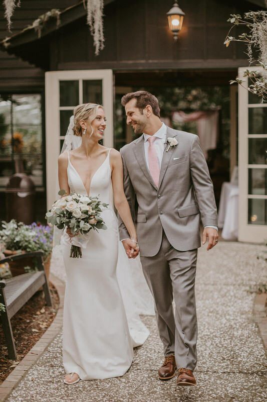 Wide landscape portrait of the couple on the Magnolia Plantation grounds
