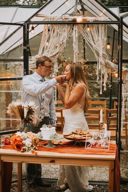 Bride and groom sharing a quiet moment under the string lights