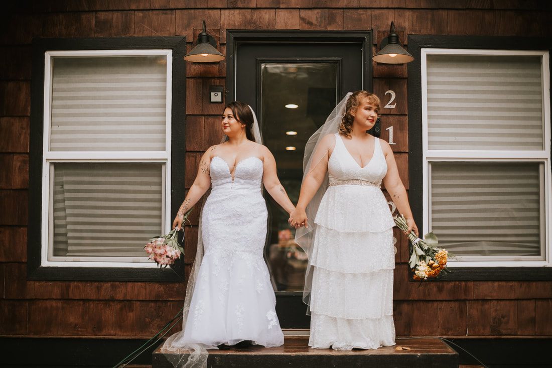 A bride portrait in the misty Washington forest surrounding the cabin, captured from another angle