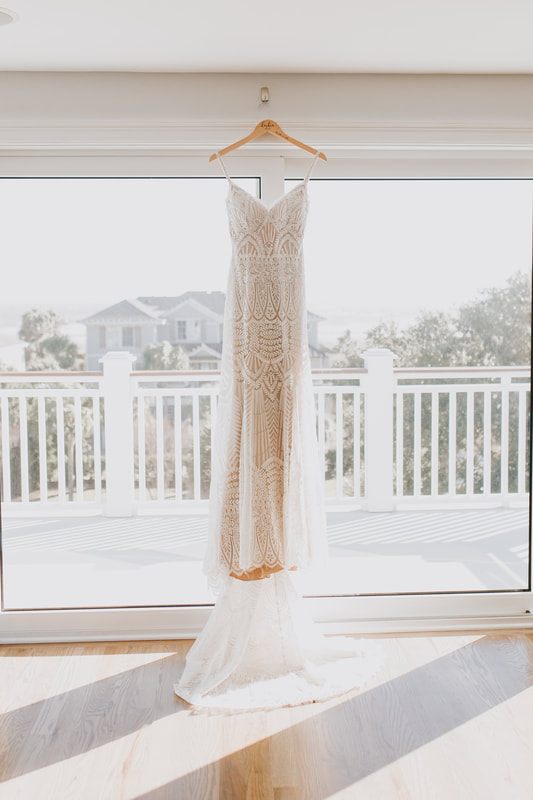 Guests gathered for the small intimate beach ceremony in Charleston