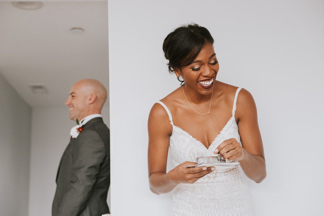 The couple exchanging vows during their intimate elopement ceremony on Isle of Palms, further into the evening
