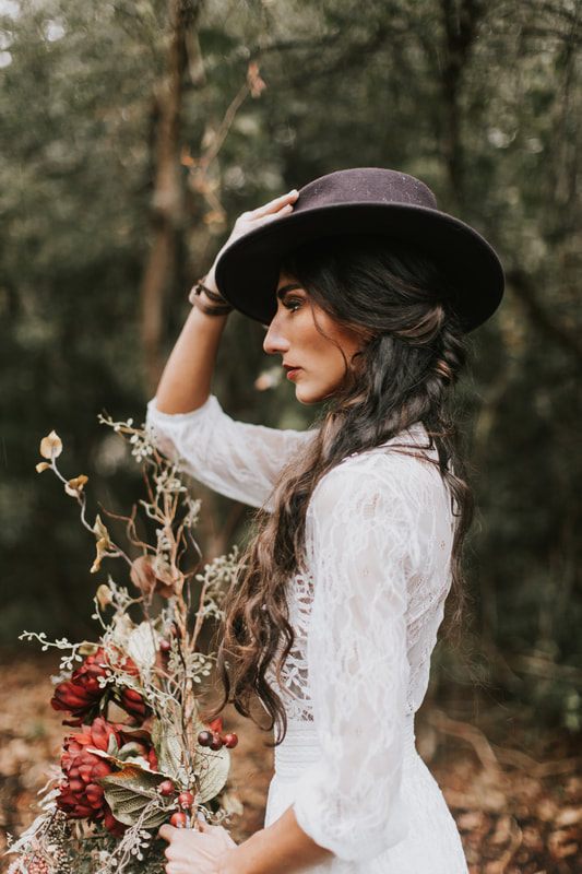 Close-up bridal portrait with soft natural forest light