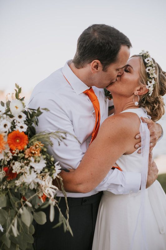 Tomi and Daniel sharing a close moment during their Moses Lake micro wedding.