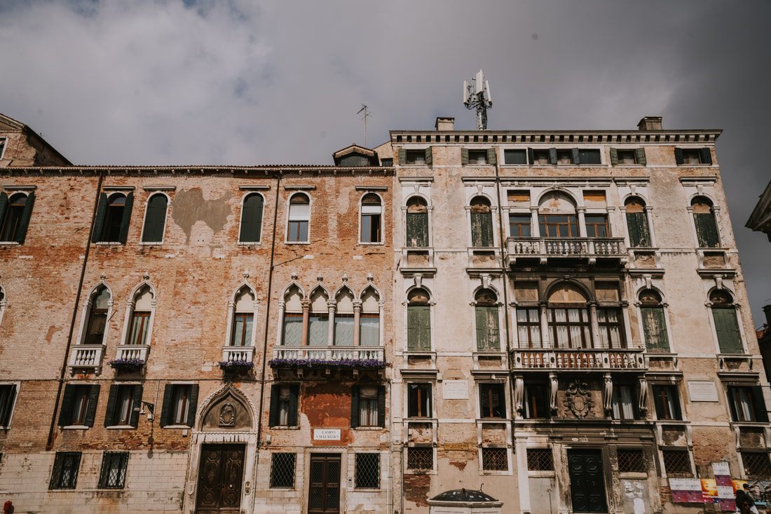 View from a Venice balcony overlooking the canal below