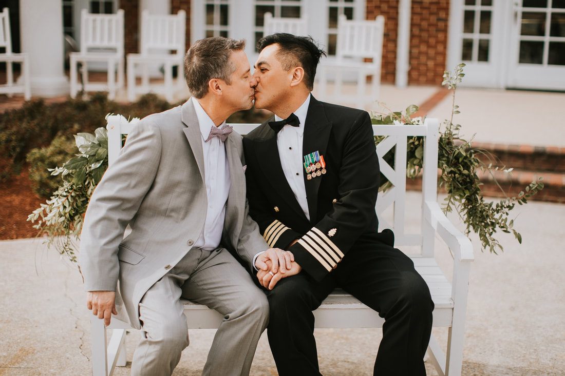 Fritz and Christopher exchange vows during their Virginia Beach wedding.