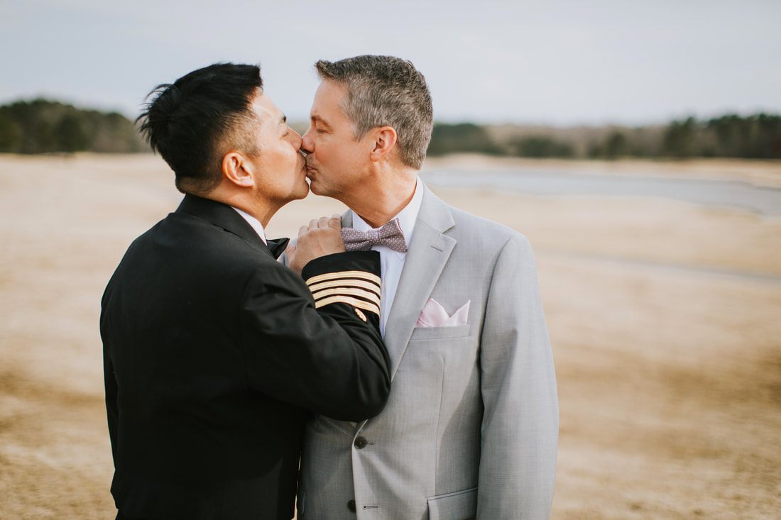 Fritz and Christopher dance together during their wedding reception.