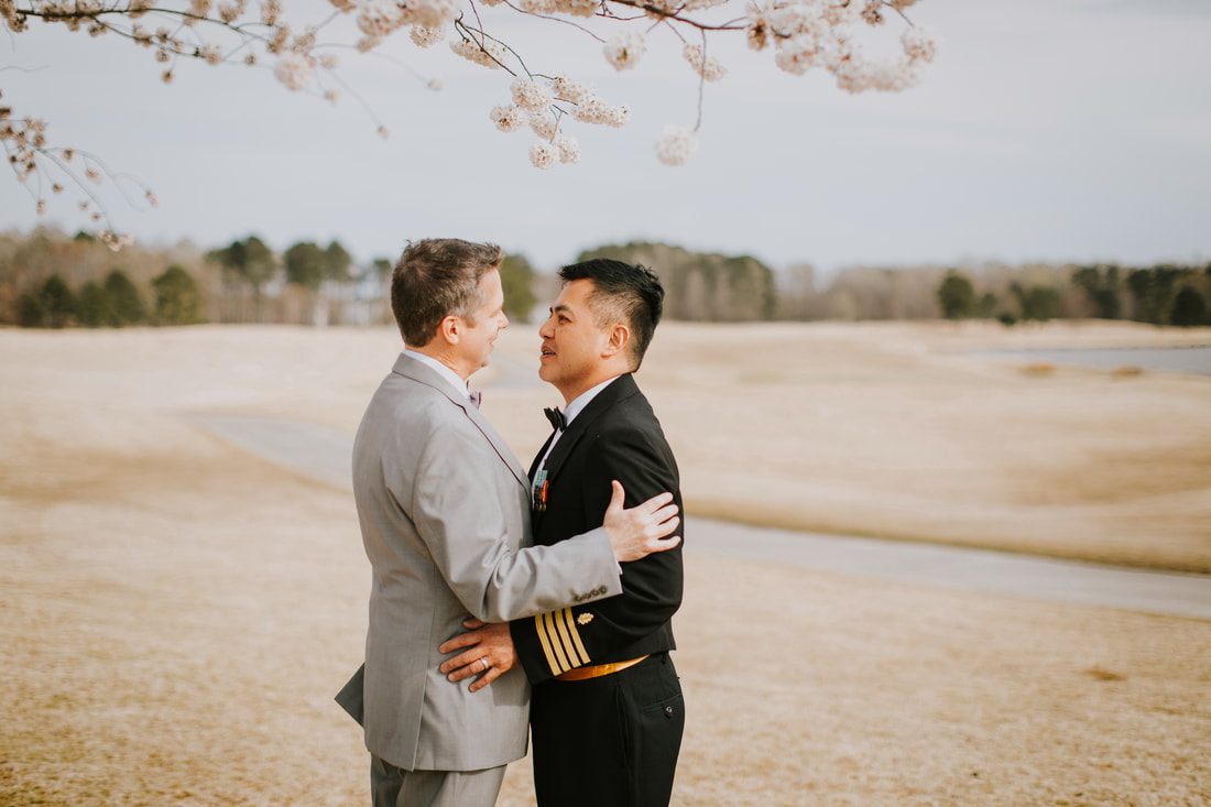 Guests celebrate with Fritz and Christopher at their Virginia Beach wedding.