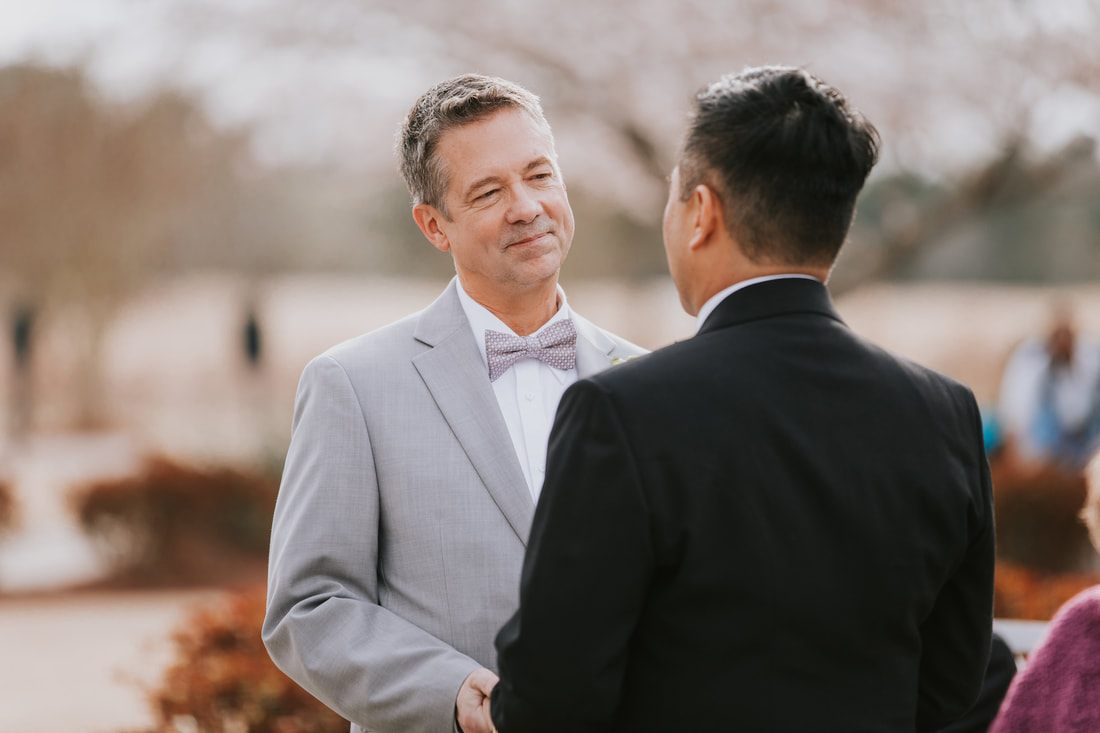 A close-up portrait of Fritz and Christopher on their wedding day.