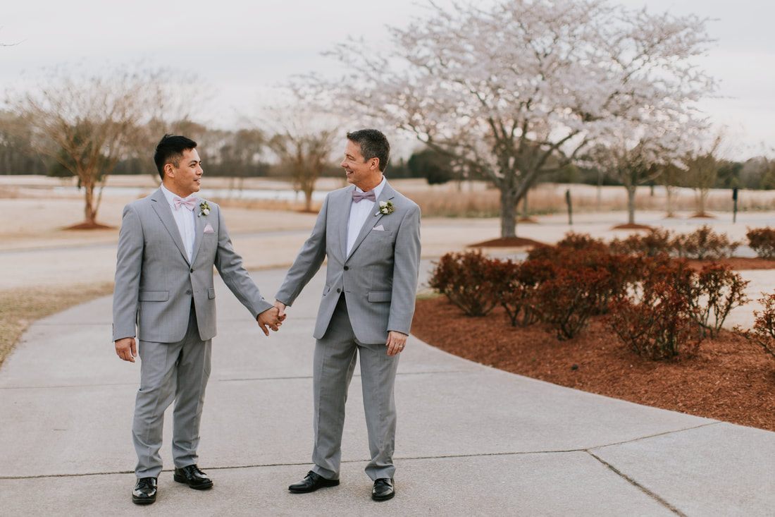 Guests celebrate with Fritz and Christopher at their Virginia Beach wedding.