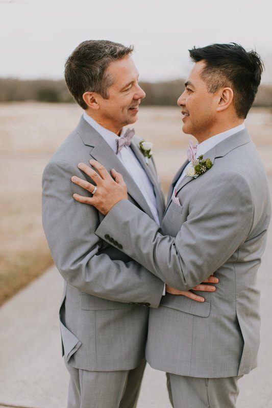 Fritz and Christopher exchange vows during their Virginia Beach wedding.