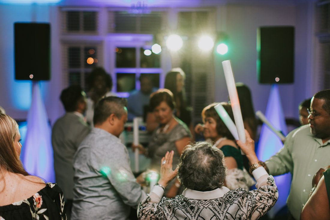 Fritz and Christopher dance together during their wedding reception.