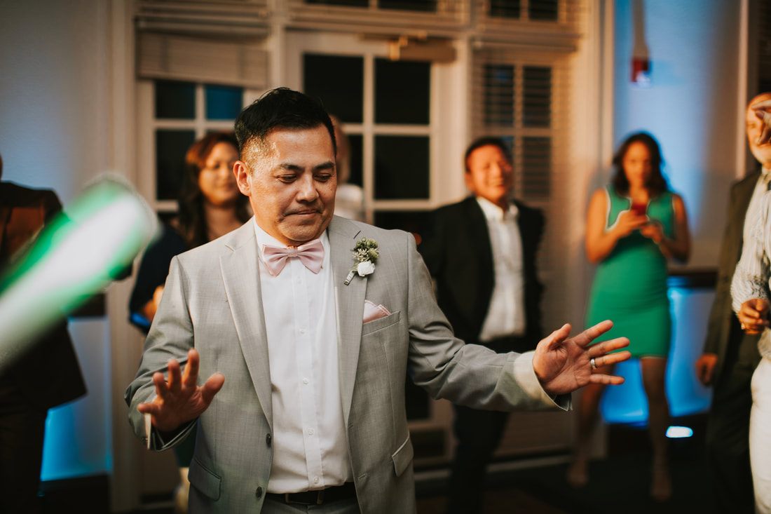 Guests celebrate with Fritz and Christopher at their Virginia Beach wedding.