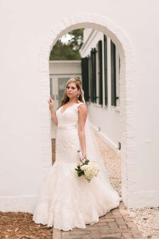 Close-up bridal portrait highlighting Lauren's dress details and jewelry
