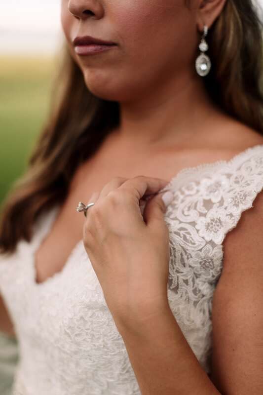 Lauren walking through the plantation gardens in her wedding gown