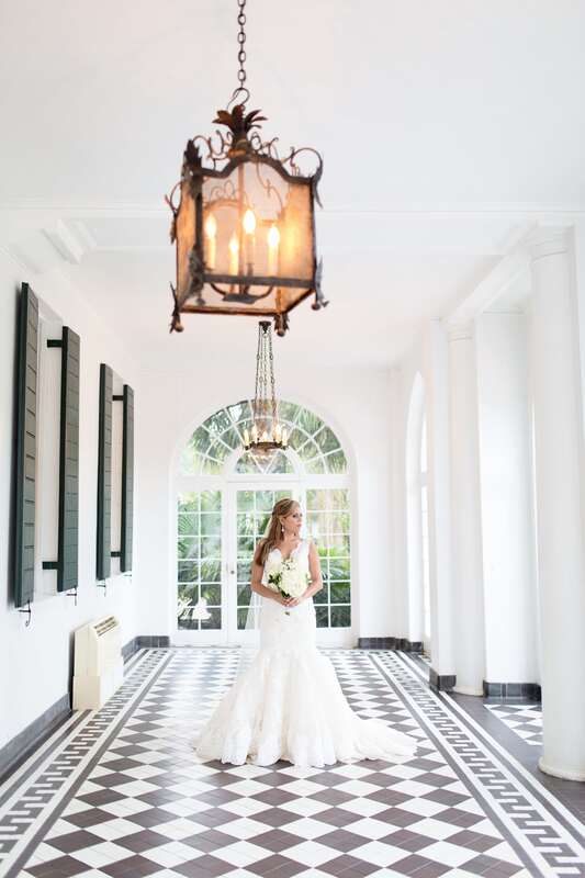 Lauren posed elegantly on the plantation lawn during golden hour light