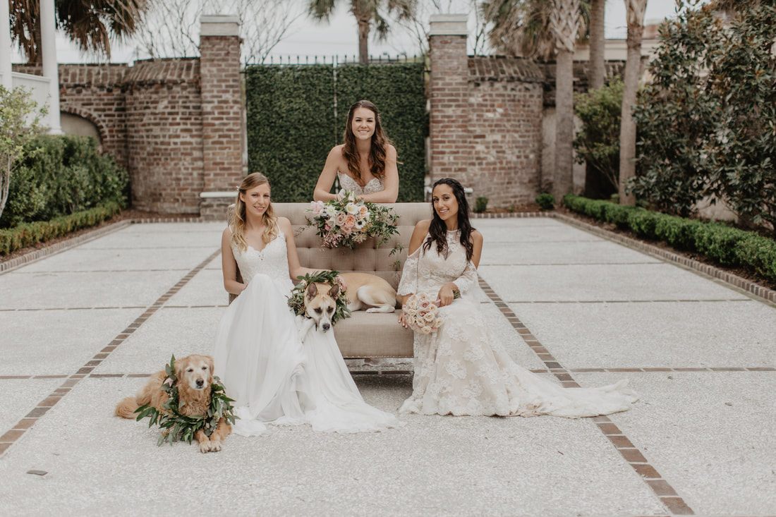Three brides getting ready together in a sunlit room at Gadsden House