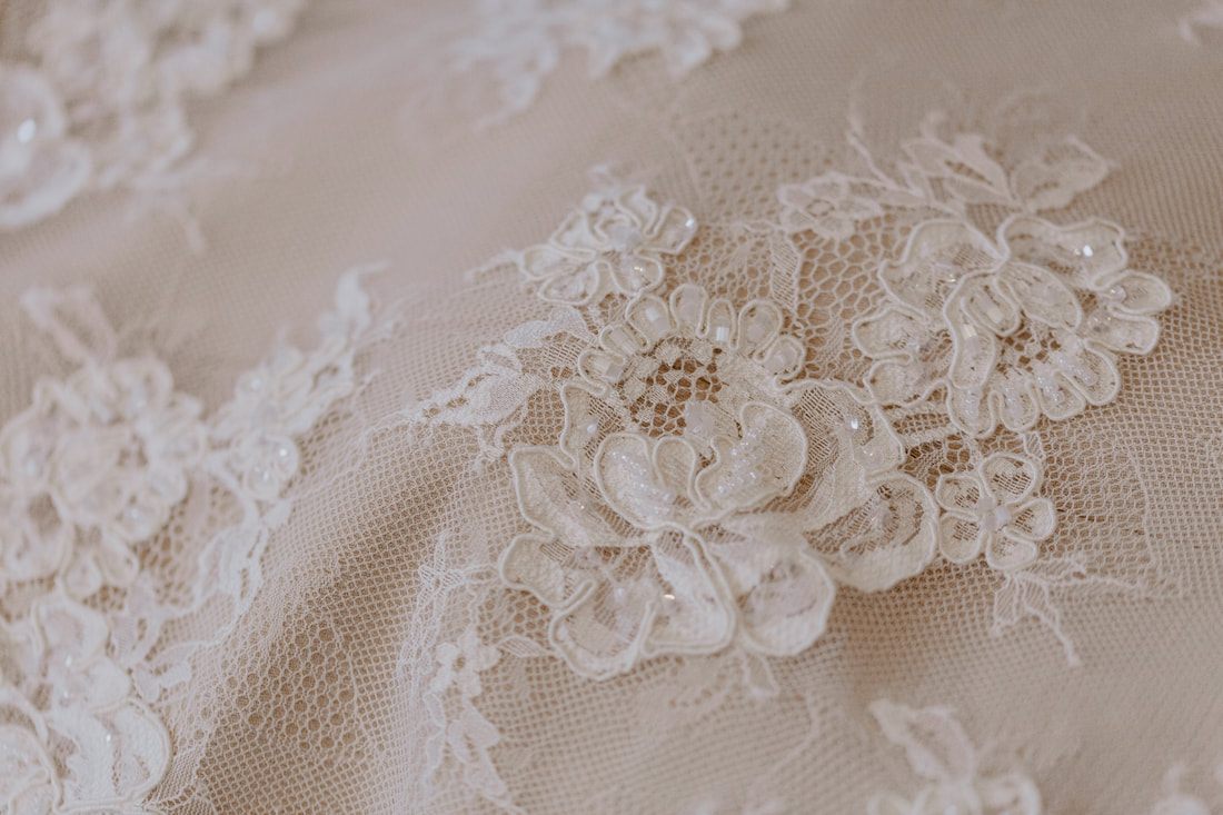 Close-up of bridal jewelry laid out before the Charleston soiree