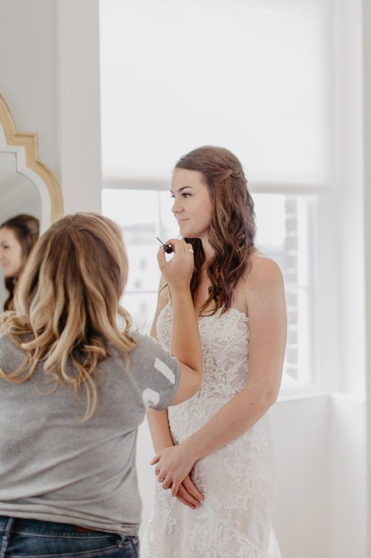 Quiet moment shared between two brides at Gadsden House