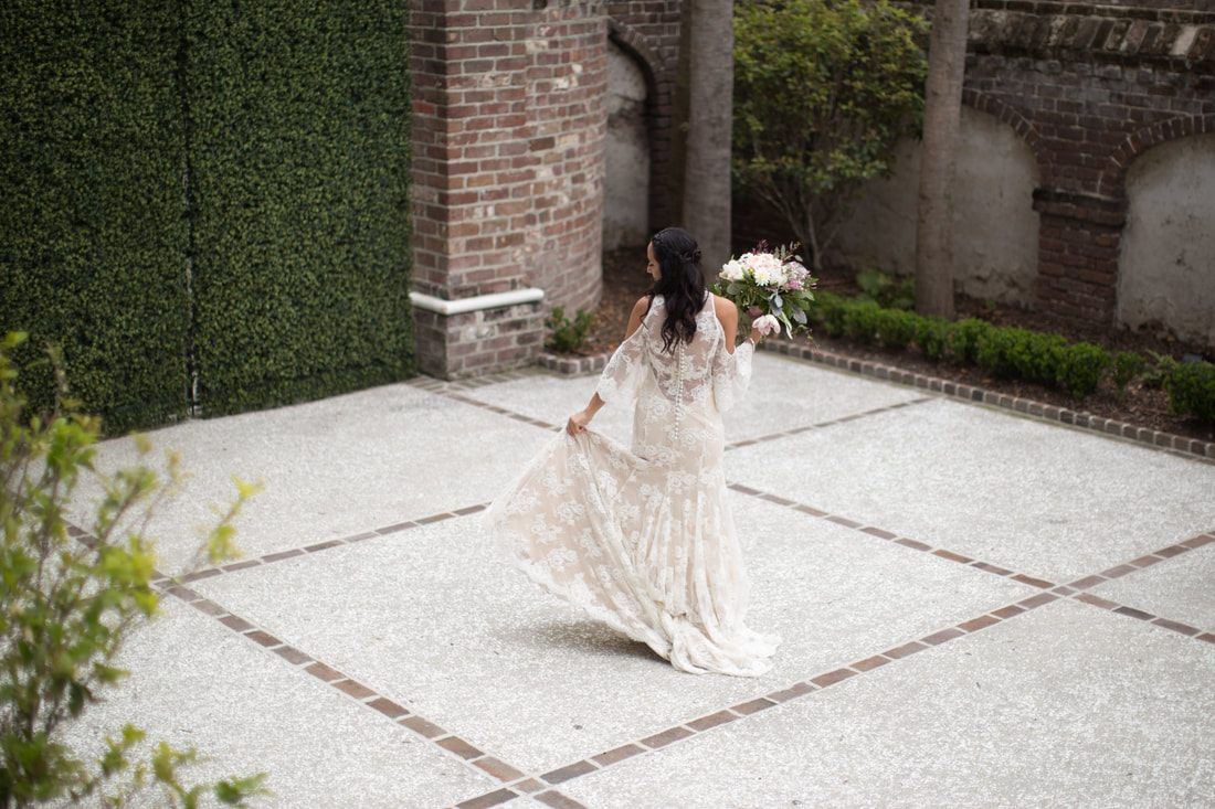 Brides toasting with champagne flutes before the soiree