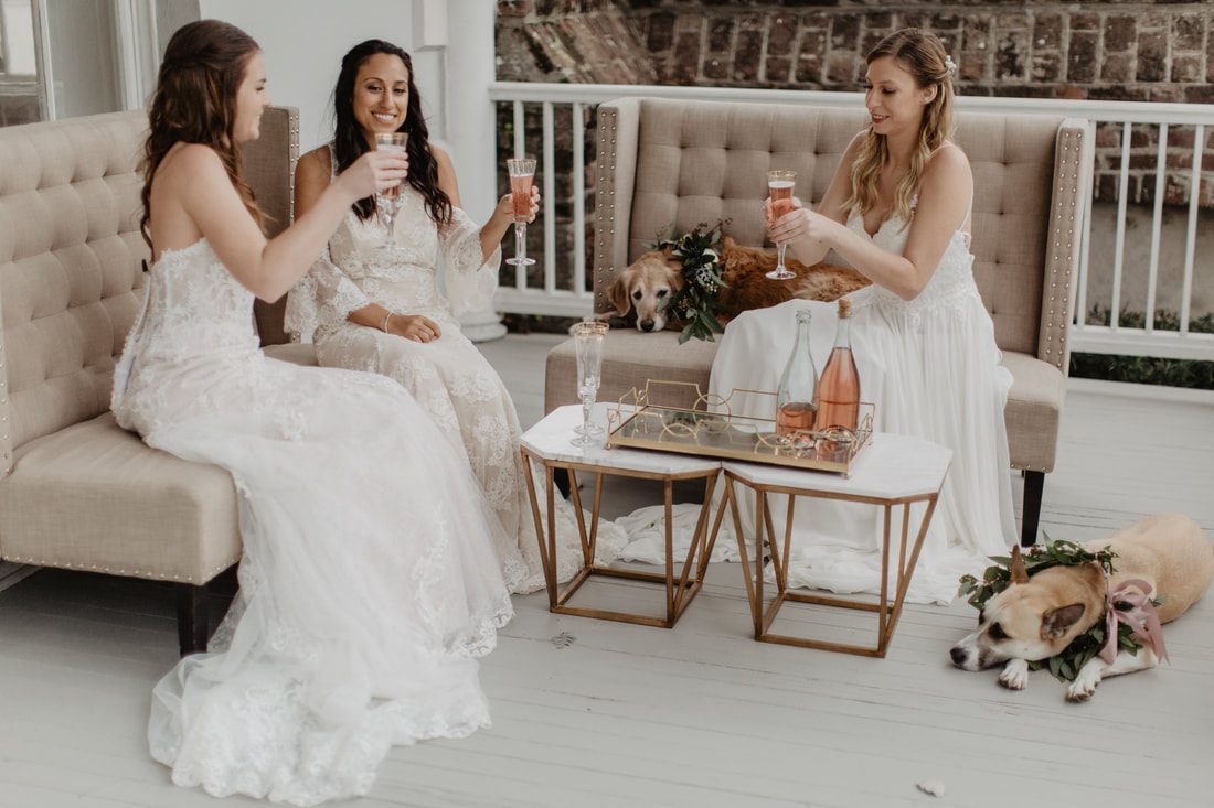Candid portrait of a bride mid-laugh at the Charleston soiree