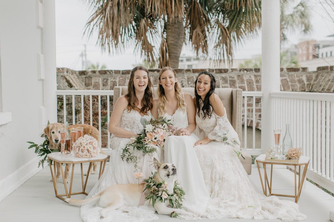 Three brides walking down the Gadsden House staircase together