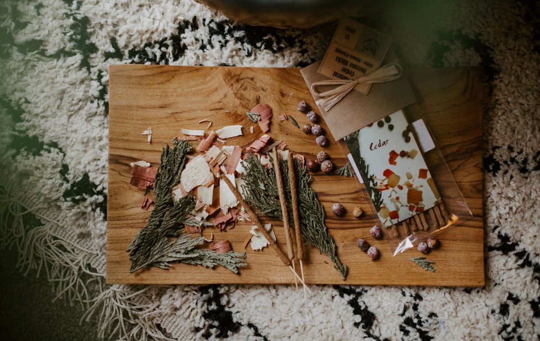 Product photography of Leftover Hippies incense arranged on a wood surface