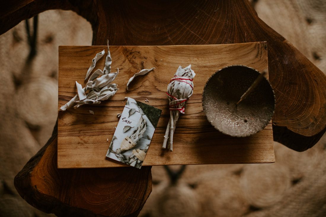 Close-up of burning incense with smoke rising, styled for Leftover Hippies