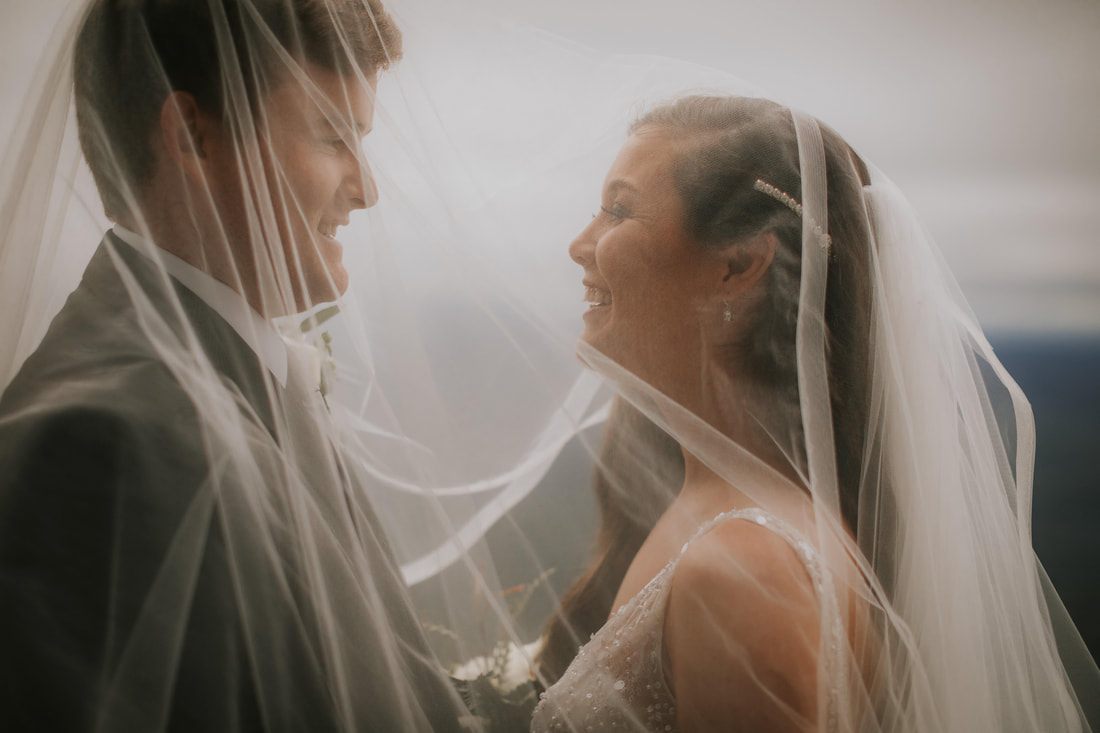 Cassandra and Charlie exchange vows at Pretty Place Chapel in the Blue Ridge Mountains.