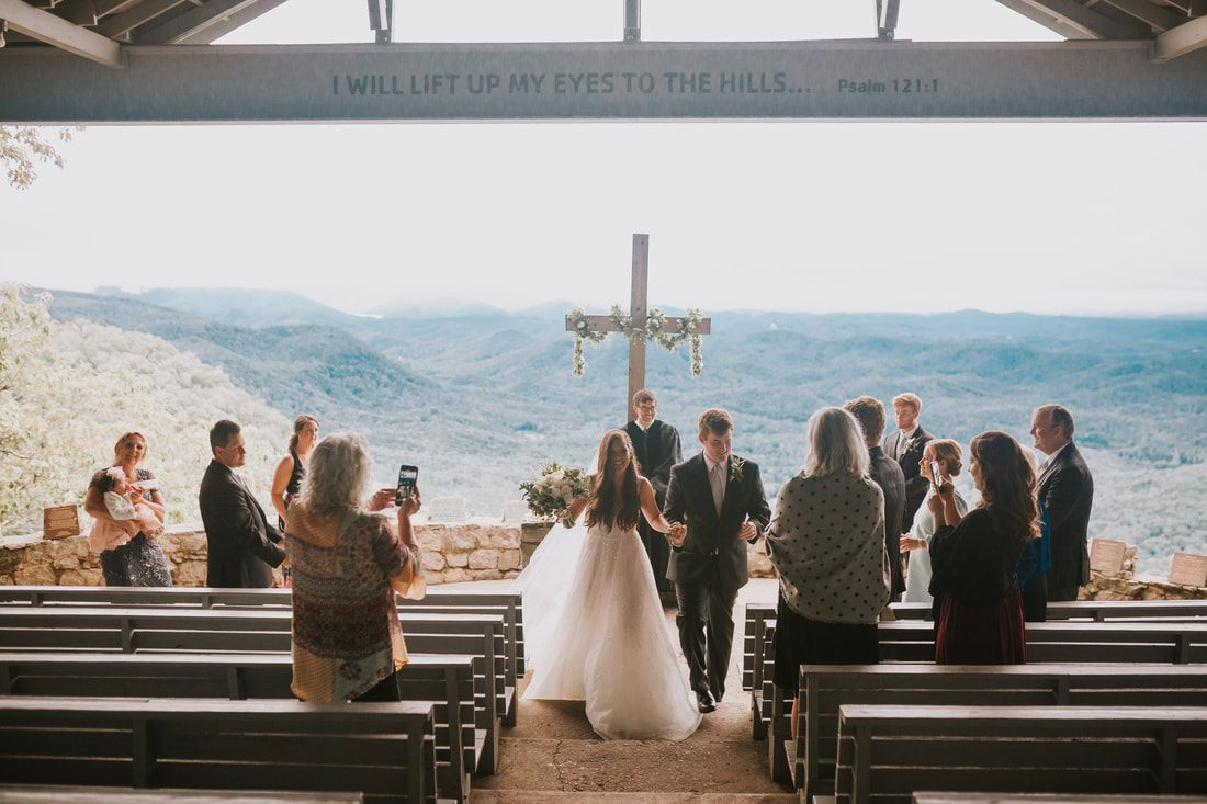 Cassandra and Charlie share their first kiss as a married couple in the mountains.