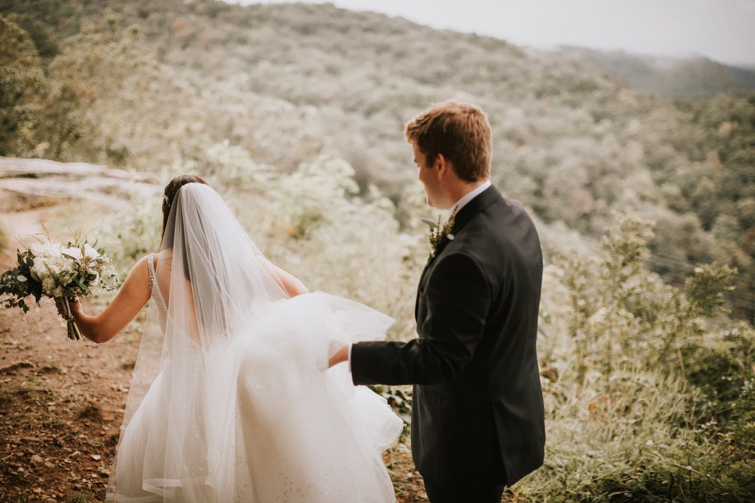 Detail shot of the wedding rings during Cassandra and Charlie's mountain wedding.