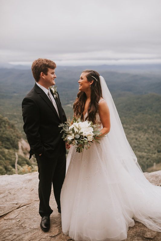 The reception tablescape and florals at Cassandra and Charlie's mountain wedding.