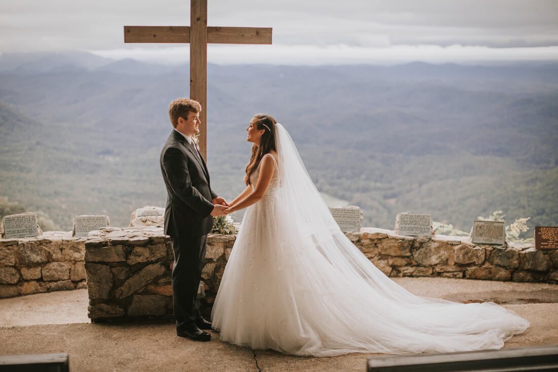 Cassandra and Charlie dance together during their intimate wedding reception.