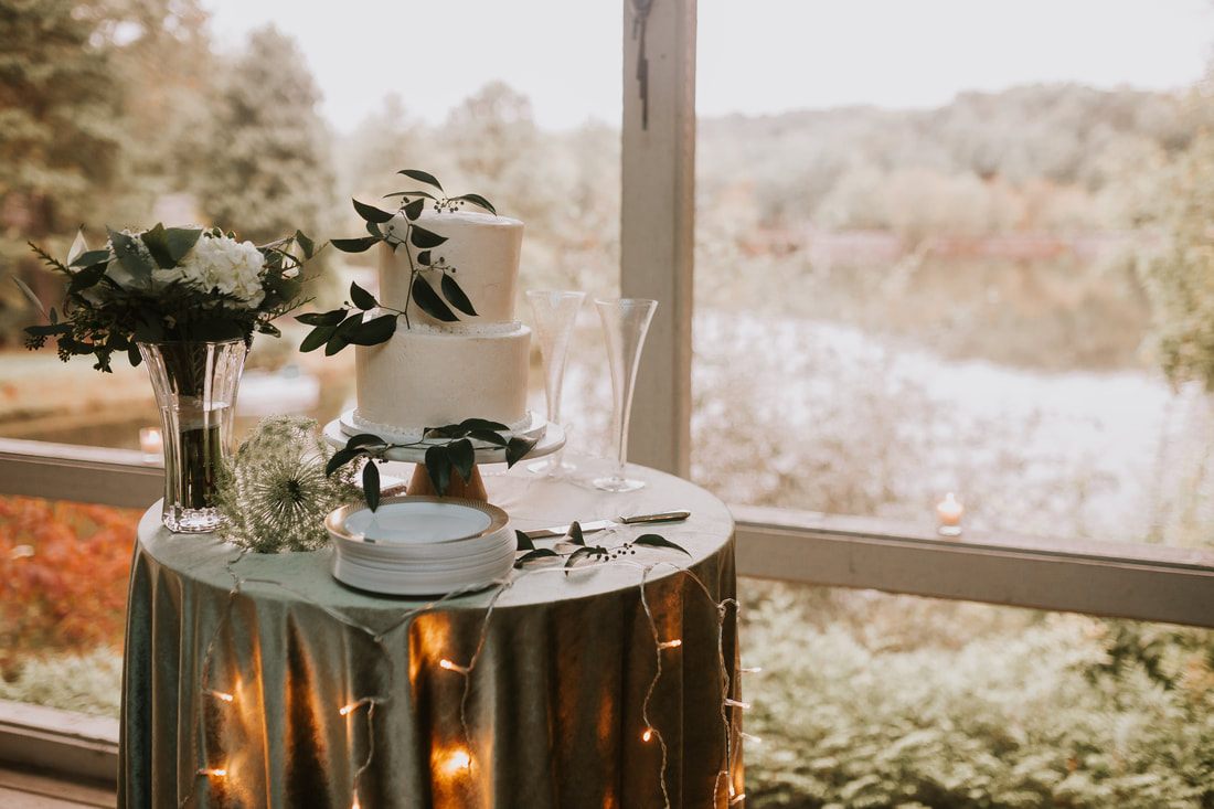 Cassandra and Charlie exchange vows at Pretty Place Chapel in the Blue Ridge Mountains.