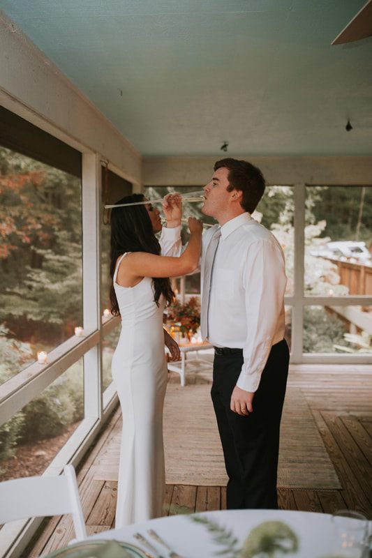 Cassandra getting ready at the lake house before her Blue Ridge Mountains wedding.