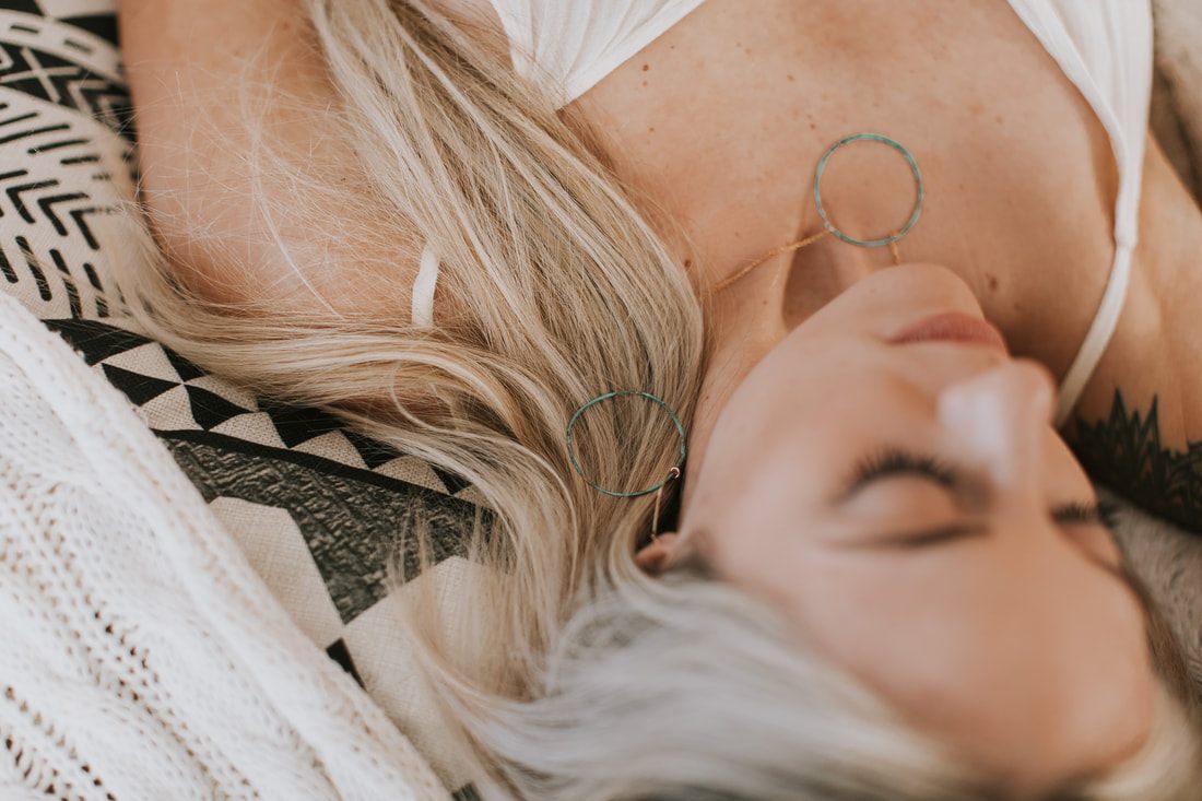 Samantha wearing handmade DeeRuel jewelry, styled for the Charleston-based brand