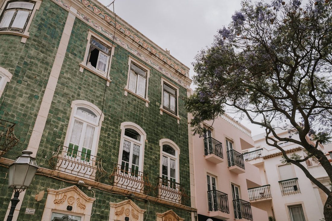 Colorful tiled building facade in a coastal Portuguese town (another frame from the trip)