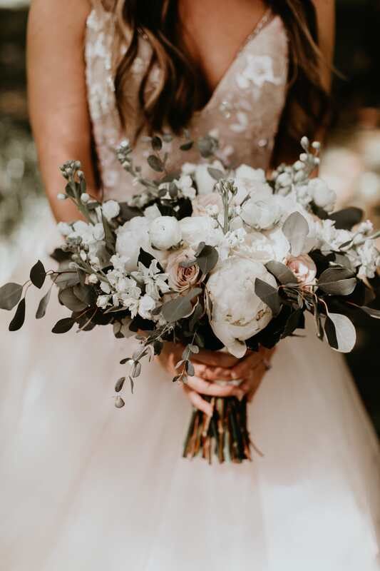 Bride's gown detail captured in soft afternoon light