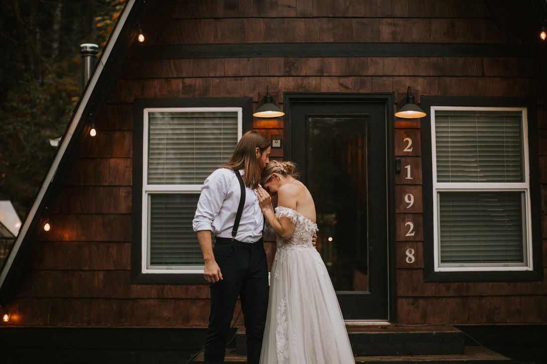 Candid moment of Tiana and Malik laughing together at That PNW Cabin.
