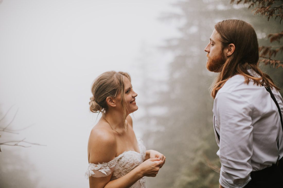 Tiana and Malik dancing together outside That PNW Cabin after their ceremony.