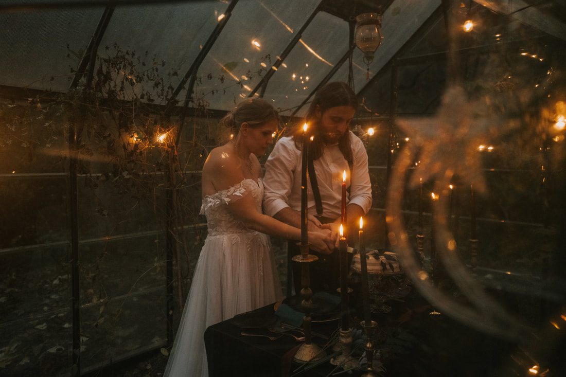 Tiana and Malik dancing together outside That PNW Cabin after their ceremony.