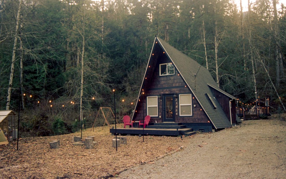 Film photograph of the PNW cabin exterior, shot by Lyndsey Hansen