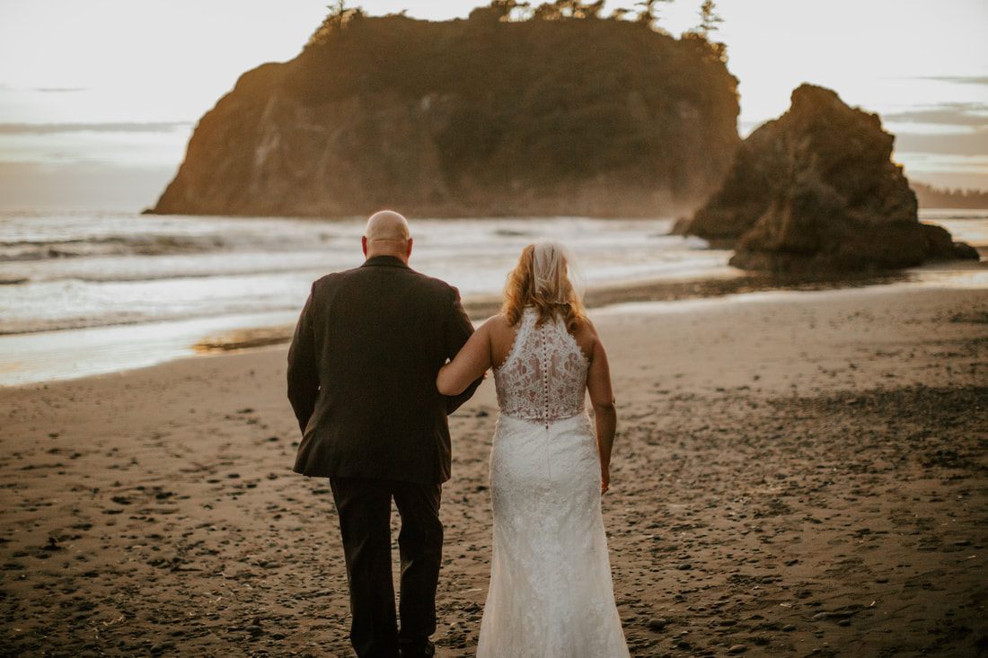 Chris and Shannon share a quiet moment on the rocky La Push shoreline.