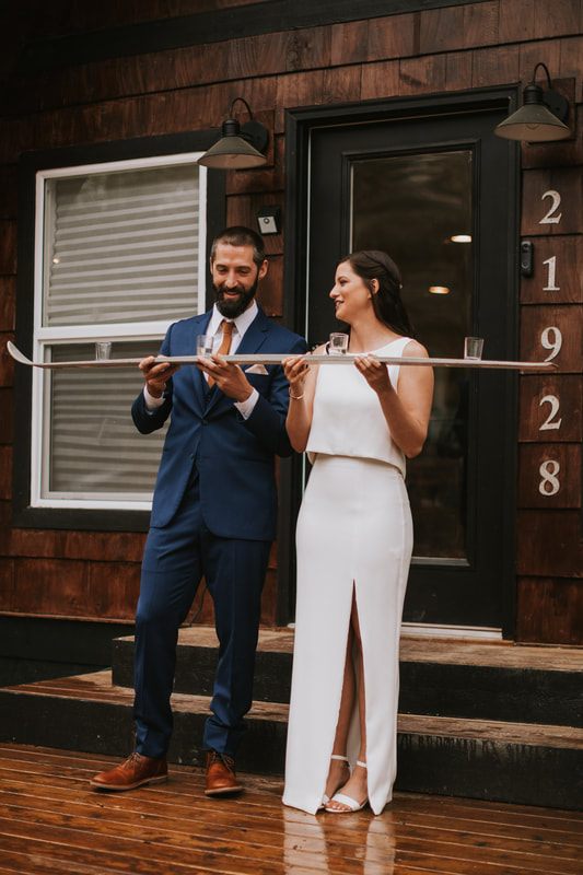 Elopement couple embracing near the mountains at That PNW Cabin